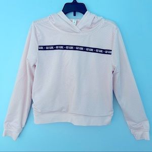 Ideology Long Sleeve Hooded Lined Mesh Top. “Go Girl” repeated across front.